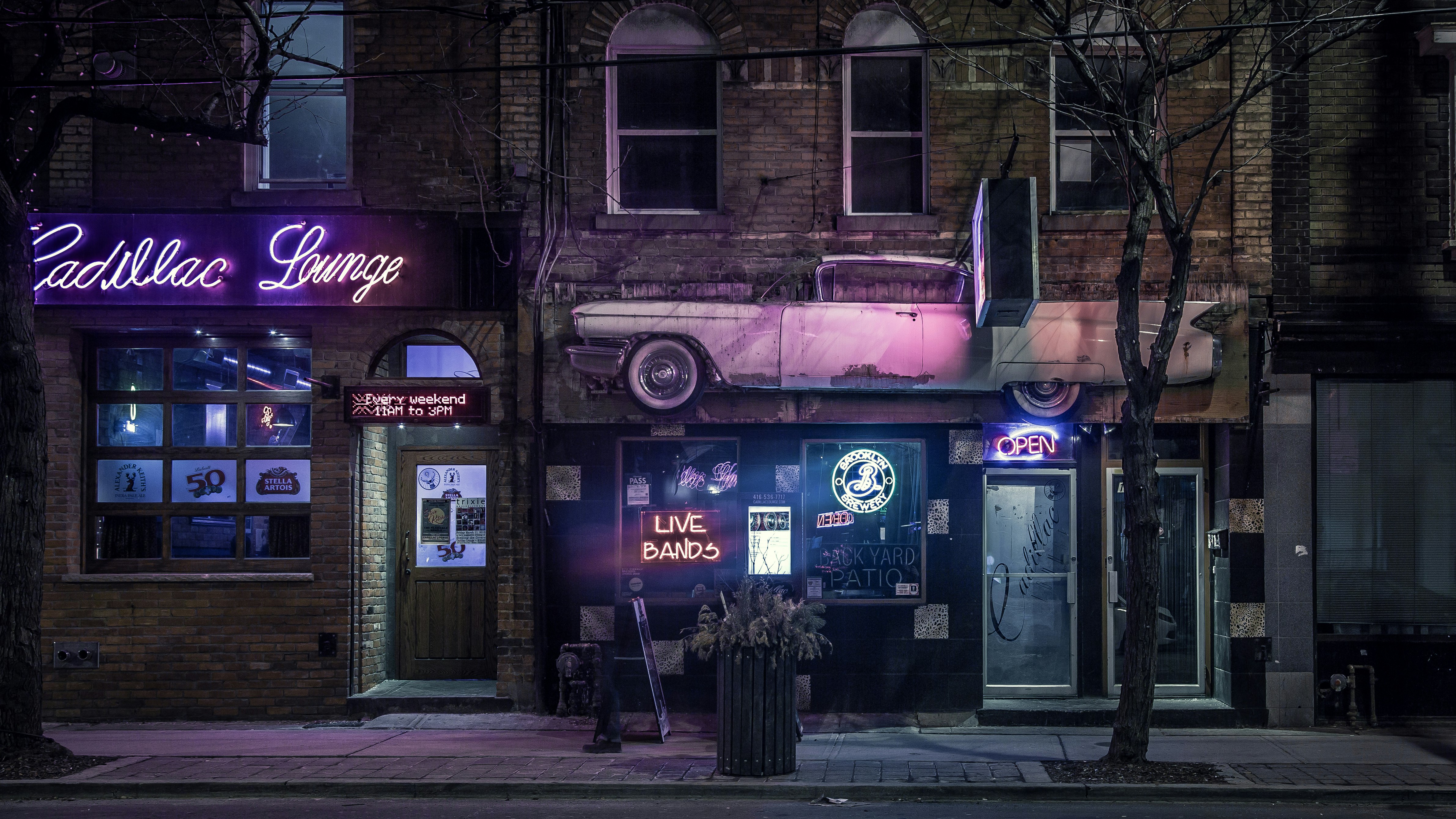 white LED neon signage on store